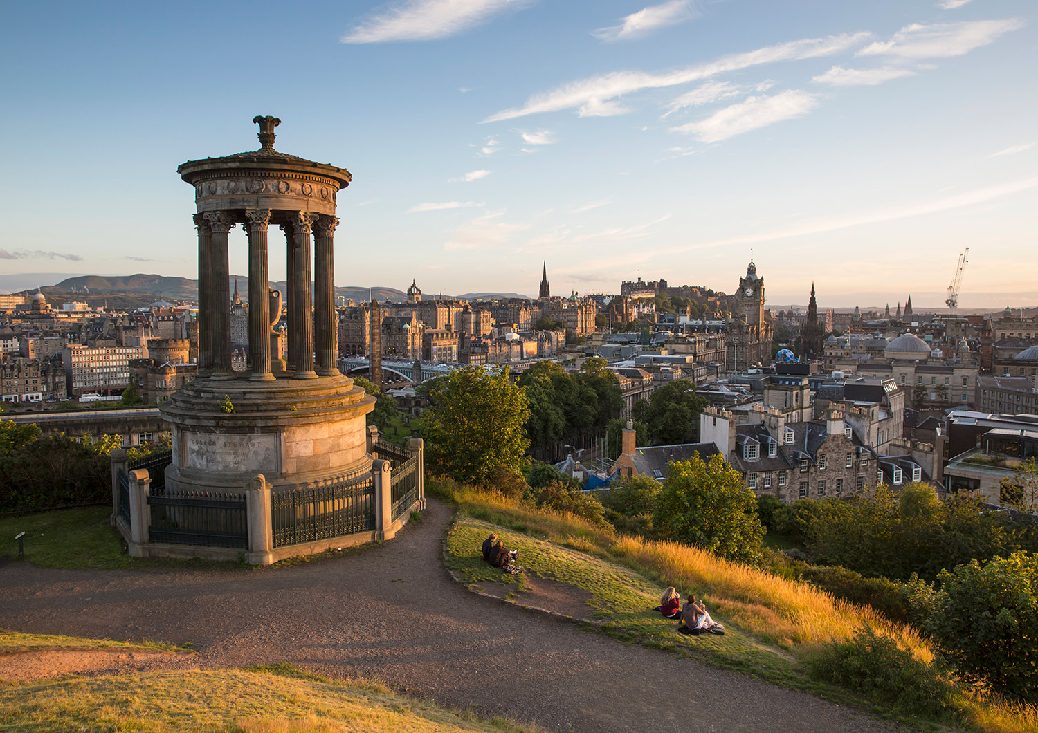 Looking across Edinburgh from Calton hill, with the Dugald Stewart Monument in the forground.